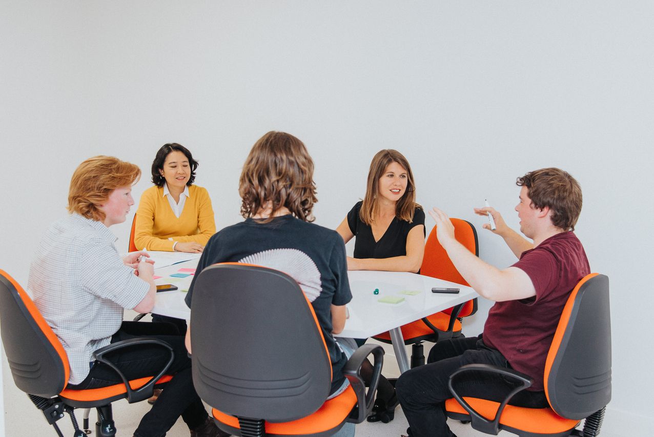 Promotional Photography - Students talking with teacher