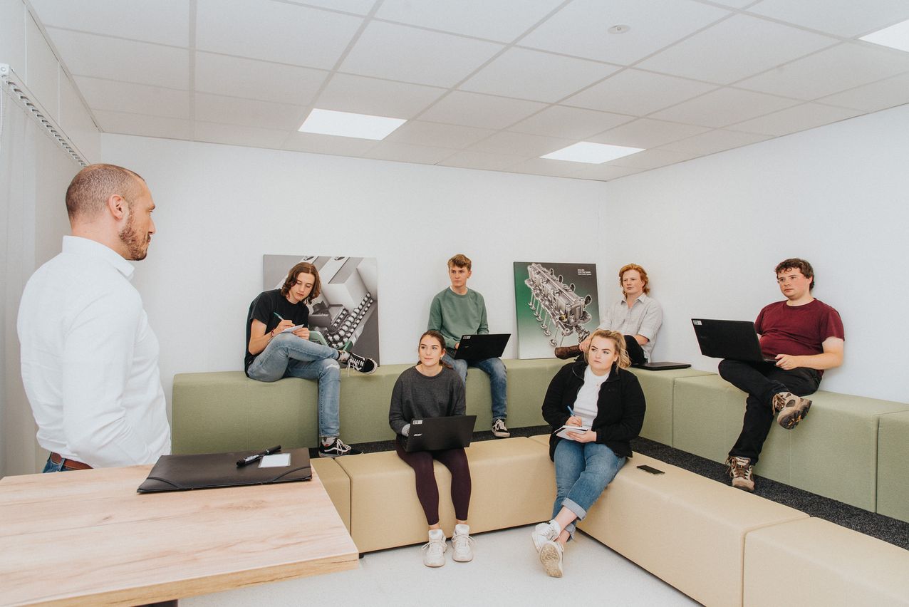 Promotional Photography - Students talking with teacher