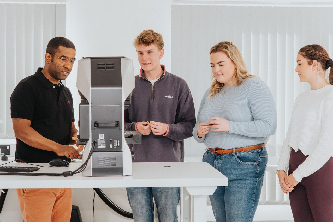 Promotional Photography - Students talking with teacher